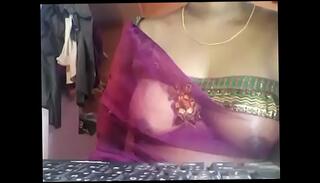 Watch the video about Indian aunty showed tits on chat