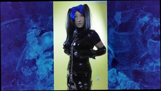 Watch the video about Kira Frost 11_Latexcatsuit with FemMask and blue Hair 01