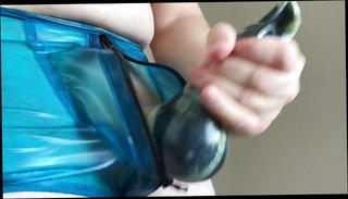 Watch the video about Cumming with layered LATEX cock sheath and pants