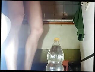 Watch the video about A huge two-liter bottle in the tender and sweet ass of a young guy who is playing with himself alone in the bath(PART 2)