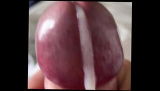 Watch the video about Close up cumshot wank