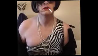 Watch the video about Cd Nikki silver dress smoking