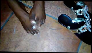 Watch the video about Ebony chic Ashley feet looped