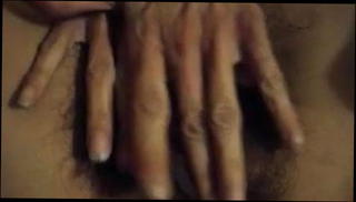 Watch the video about Hairy pussy fingering