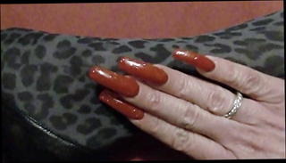 Watch the video about My long nails in sparkling red nail polish