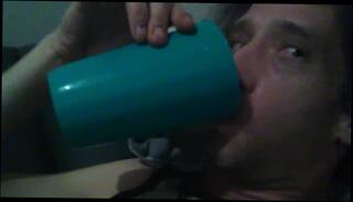 Watch the video about Greedily Tasting Golden Cup of My Fresh Piss