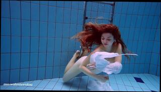 Watch the video about Relaxing underwater show with hot girls