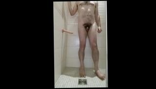 Watch the video about Hairy guy takes a shower and fucks himself with dildo