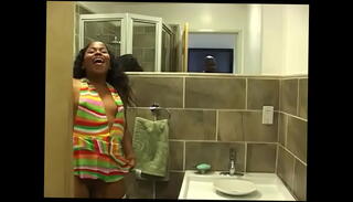 Watch the video about Ebony chick in white fishnet stockings pissing in the toilet and filming