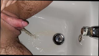 Watch the video about Morning piss in the bidet