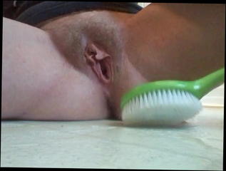 Watch the video about Wow, brush head insertion in her nice pussy