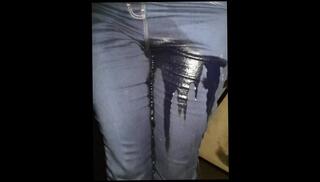 Watch the video about Sexy gf re wets her Jean's in the car, then finishes soaking them standing!