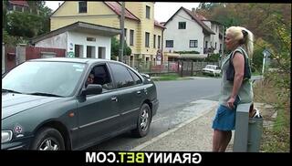 Watch the video about Hitchhiking old granny and boy fucking outside