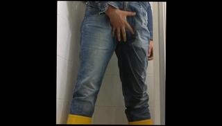 Watch the video about Little Pee and shower in jeans and boots