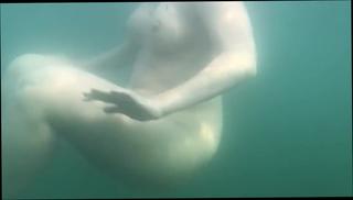 Watch the video about Underwater naked swim