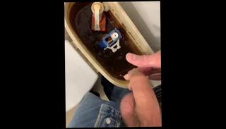 Watch the video about Pissing into foreskin, horny and cum in public toilet