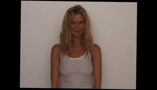 Watch the video about Claudia Schiffer showing nipples in a see-through shirt