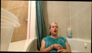 Watch the video about Trans girl does a golden shower