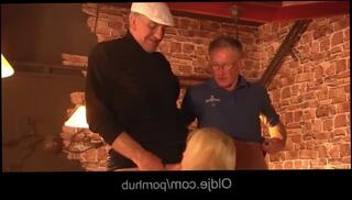 Watch the video about Turists old men threesome with bimbo american blonde in a pub