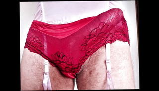 Watch the video about Big cock in red pantie