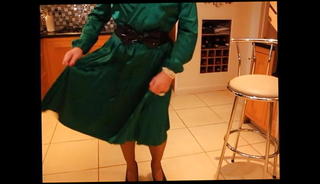 Watch the video about Sindy in green satin dress