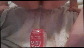 Watch the video about Anal insertion squat on evian bottle with quick cum