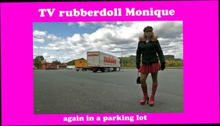 Watch the video about Rubberdoll Monique - crossdresser with female mask in public