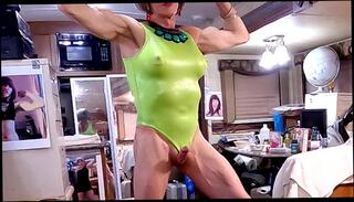 Watch the video about Alexandria Muscle-Slut Masturbates In Green One-Piece in Southbound Rest Area Family Room