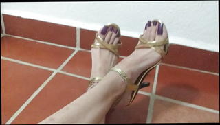 Watch the video about High heels legs and feets purpple toe nails