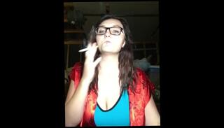 Watch the video about Hot Busty Teen Smoking & Stripping