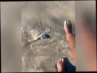 Watch the video about Sandy Feet On The Beach