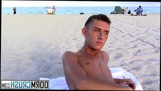 Watch the video about Skinny twink Tyler Eaten getting picked up on the nude beach