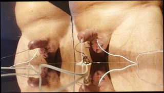 Watch the video about Estim 7 electro stimulation in the mirror big cum